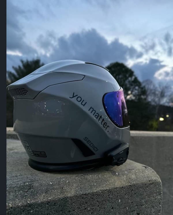 You Matter sticker on motorcycle helmet